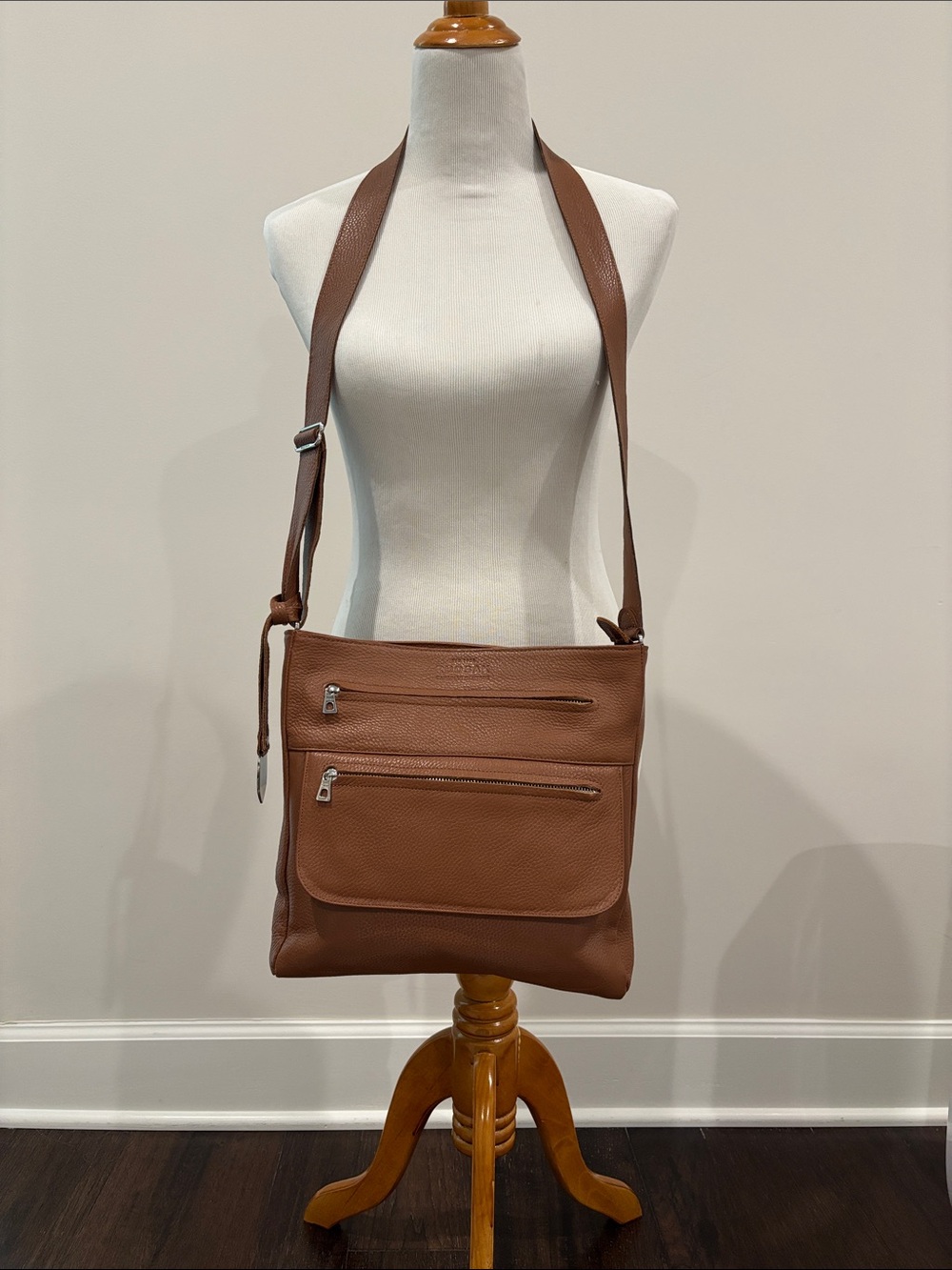 RUDSAK Tan Pebbled Leather Crossbody Bag with Front Zip Pockets